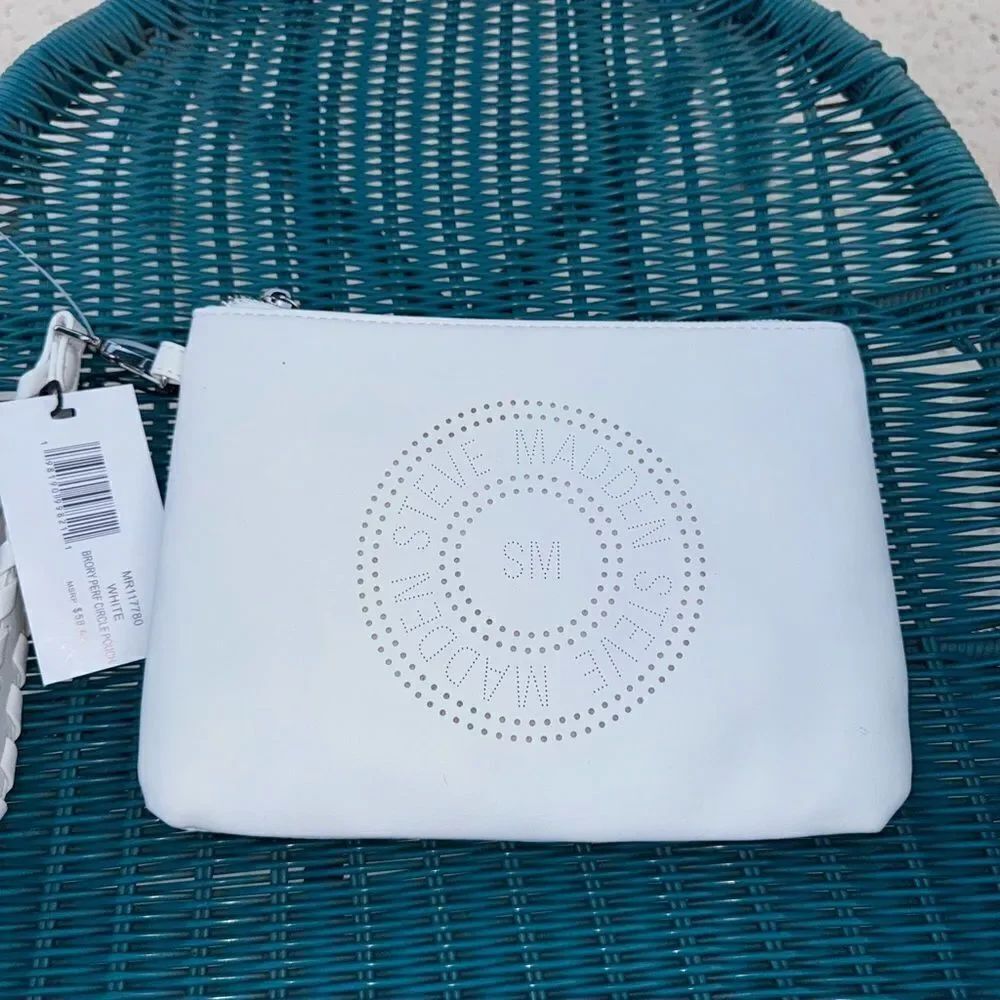 Steve Madden Perforated Round Logo
White Clutch Bag